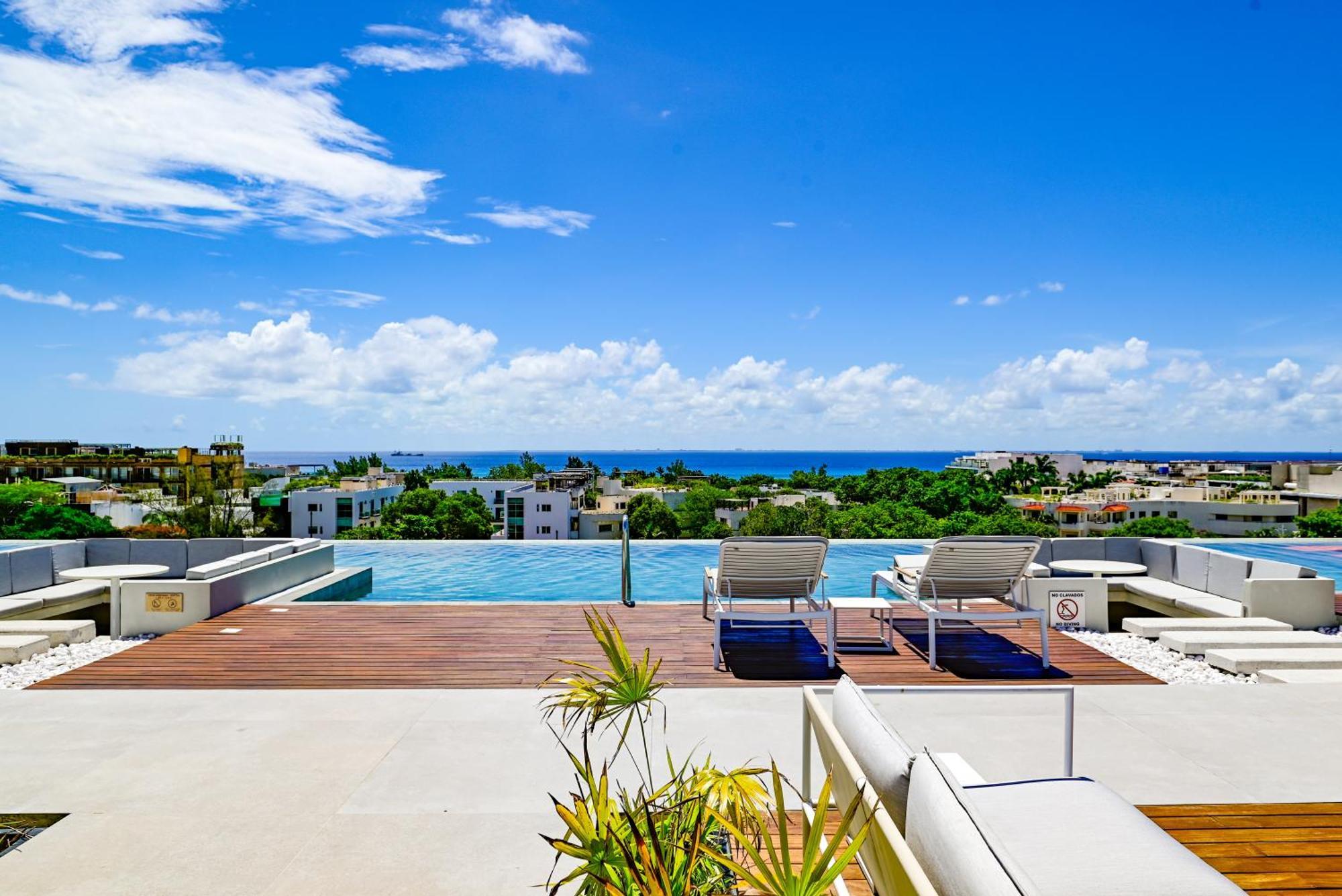 Aloft Playa Del Carmen Hotel Bagian luar foto Rooftop pool at the Ritz-Carlton, Dorado Beach, Puerto Rico